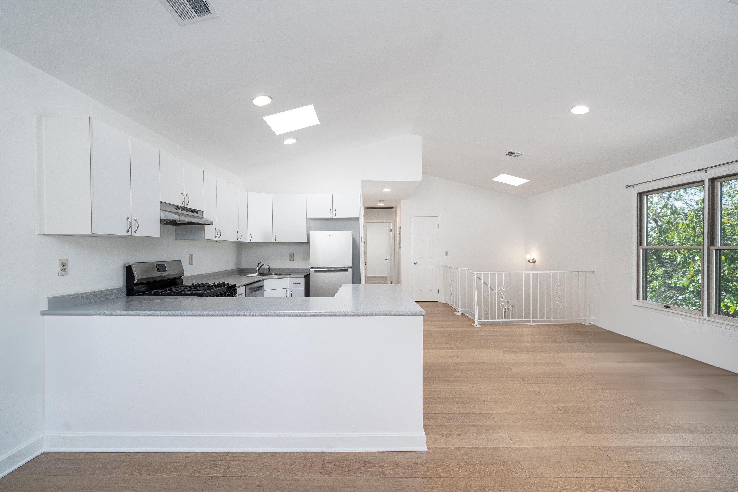 Kitchen with appliances and clean finishes