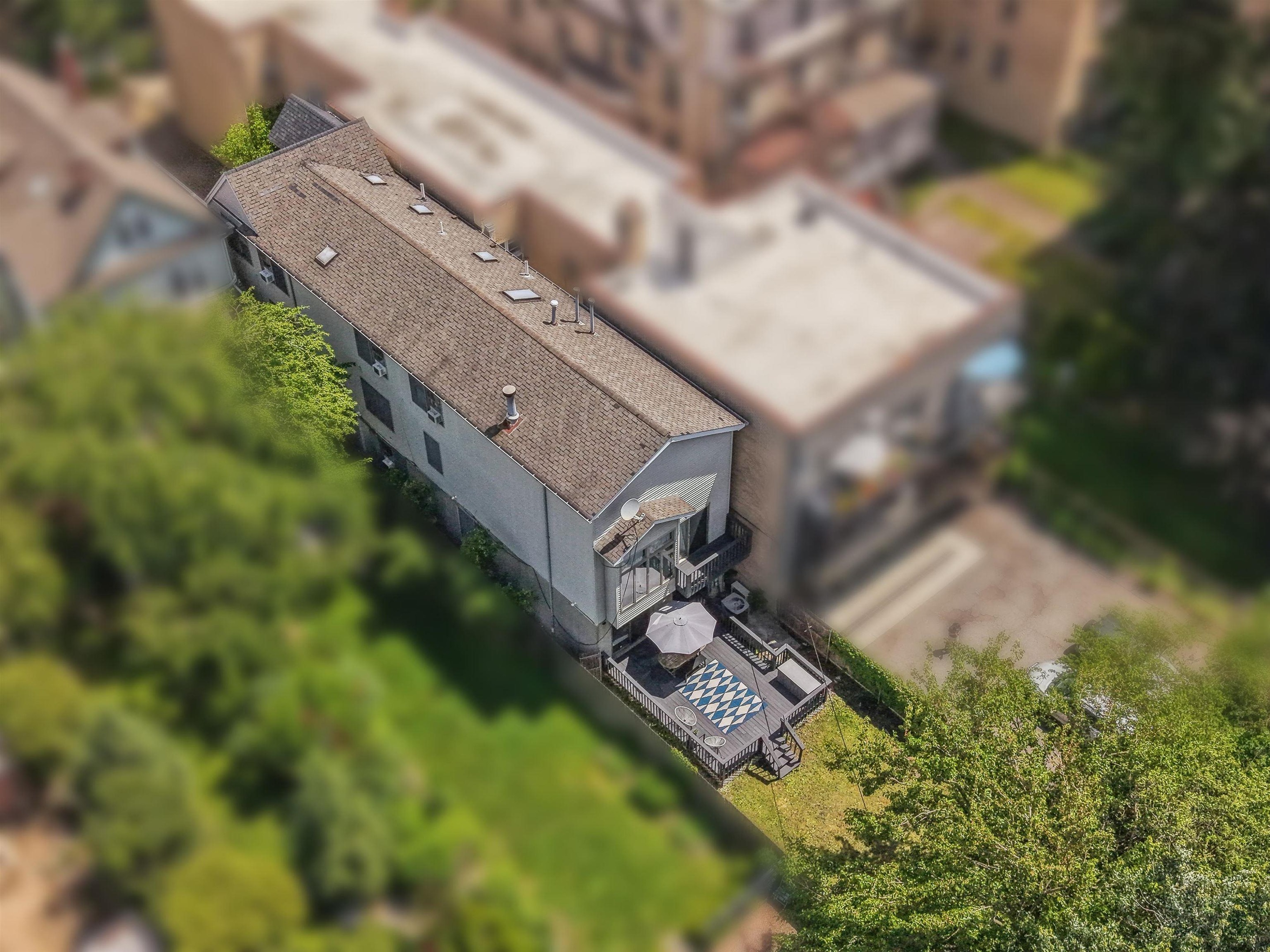 Aerial view showing lot depth and parking at 79 Sherman Place