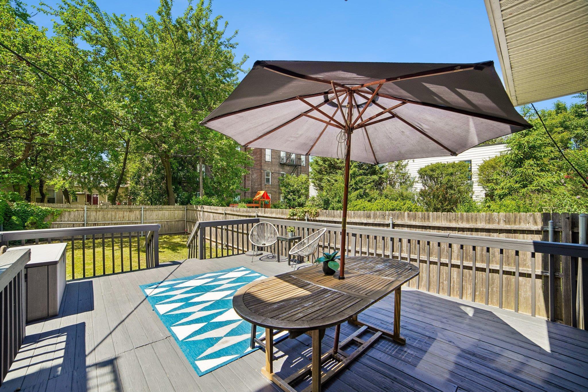 Deck with outdoor furniture and views